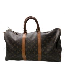 LOUIS VUITTON（ルイ ヴィトン）の古着「トラベルバッグ」｜ブラウン