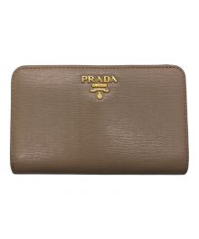 PRADA（プラダ）の古着「2つ折り財布」｜ベージュ