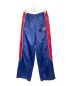 Supreme（シュプリーム）の古着「トラックパンツ Satin Track Pant」｜ブルー×レッド