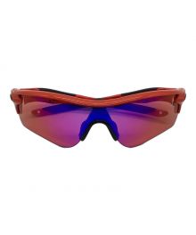 OAKLEY（オークリー）の古着「サングラス」｜レッド×ブラック