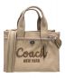 COACH（コーチ）の古着「カーゴトート26」｜ベージュ