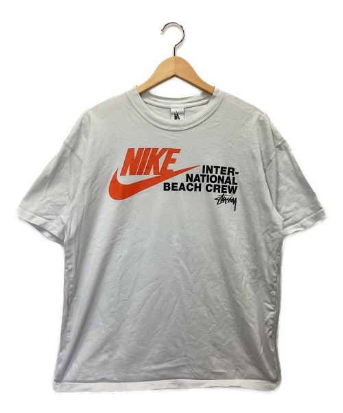 NIKE（ナイキ）NIKE (ナイキ) stussy (ステューシー) カットソー ホワイト×オレンジ サイズ:Mの古着・服飾アイテム