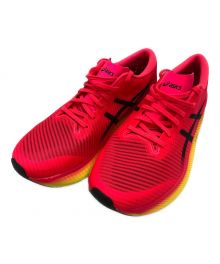 asics（アシックス）の古着「ランニングシューズ」｜レッド×イエロー