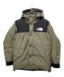 THE NORTH FACE（ザ ノース フェイス）の古着「マウンテンダウンジャケット」｜カーキ