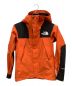 THE NORTH FACE（ザ ノース フェイス）の古着「マウンテンジャケット」｜オレンジ×ブラック