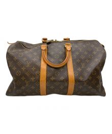 LOUIS VUITTON（ルイ ヴィトン）の古着「トラベルバッグ」｜ブラウン