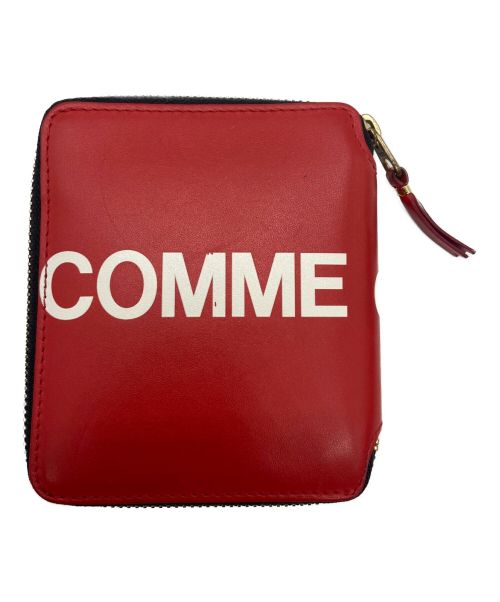 COMME des GARCONS（コムデギャルソン）COMME des GARCONS (コムデギャルソン) ヒュージロゴ2つ折り ZIPウォレット レッドの古着・服飾アイテム