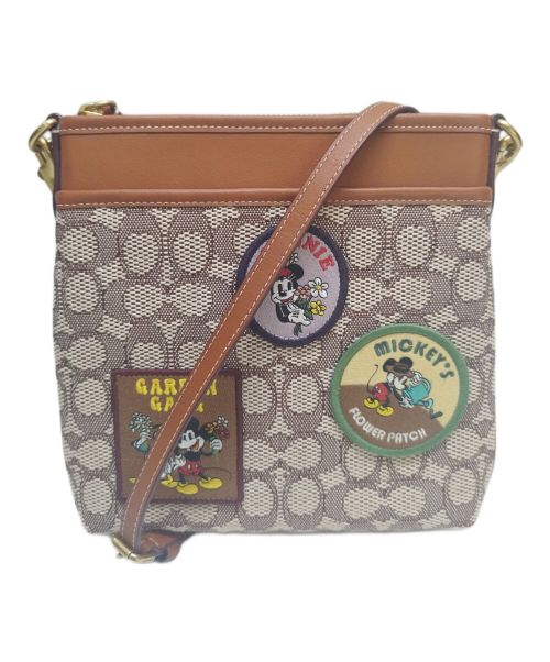 COACH（コーチ）COACH (コーチ) DISNEY (ディズニー) ショルダーバッグ キットメッセンジャークロスボディ・シグネチャーの古着・服飾アイテム