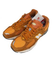 NEW BALANCE（ニューバランス）の古着「Protection Pack」｜オレンジ