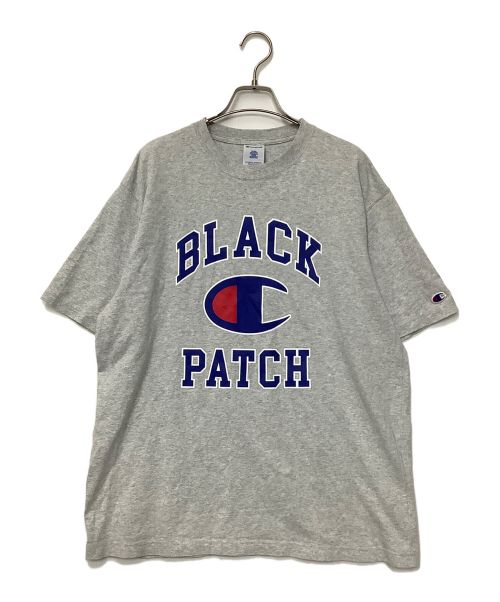 Champion（チャンピオン）Champion (チャンピオン) BlackEyePatch (ブラックアイパッチ) ロゴプリントT グレー サイズ:Lの古着・服飾アイテム