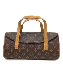 LOUIS VUITTON（ルイ ヴィトン）の古着「ソナチネ」｜ブラウン×レッド