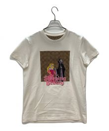 COACH×DISNEY（コーチ×ディズニー）の古着「シグネチャースリーピングビューティーTシャツ」｜ホワイト×ベージュ