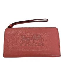 COACH（コーチ）の古着「レザーウォレット」｜サーモンピンク