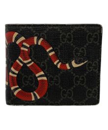 GUCCI（グッチ）の古着「スネークプリント 2つ折り財布」｜ブラック