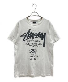 stussy（ステューシー）の古着「ワールドツアーロゴTシャツ」｜ホワイト