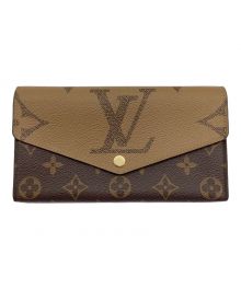 LOUIS VUITTON（ルイ ヴィトン）の古着「長財布 モノグラム・ジャイアントリバース」｜ブラウン