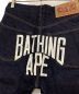 中古・古着 A BATHING APE (アベイシングエイプ) バックプリントデニムハーフパンツ インディゴ サイズ:M：12000円