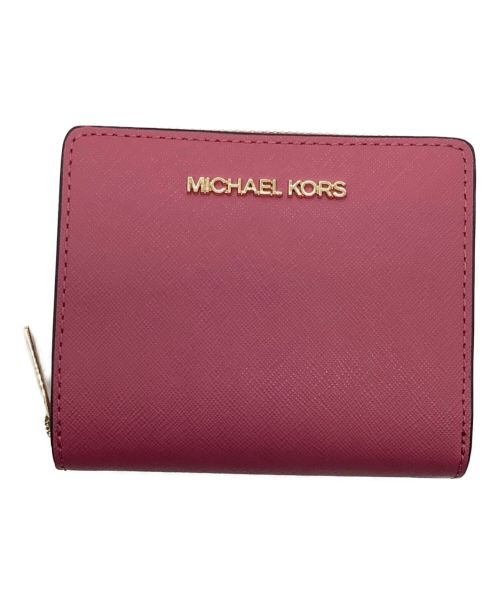 MICHAEL KORS（マイケルコース）MICHAEL KORS (マイケルコース) 2つ折り財布 ピンクの古着・服飾アイテム