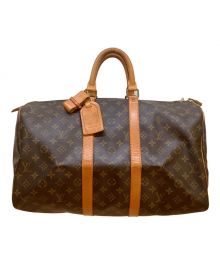 LOUIS VUITTON（ルイ ヴィトン）の古着「トラベルバッグ」｜ブラウン