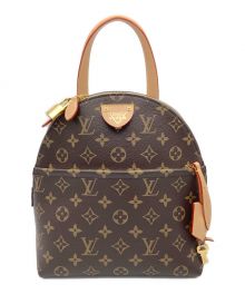 LOUIS VUITTON（ルイ ヴィトン）の古着「LVムーンバックパック」｜ブラウン