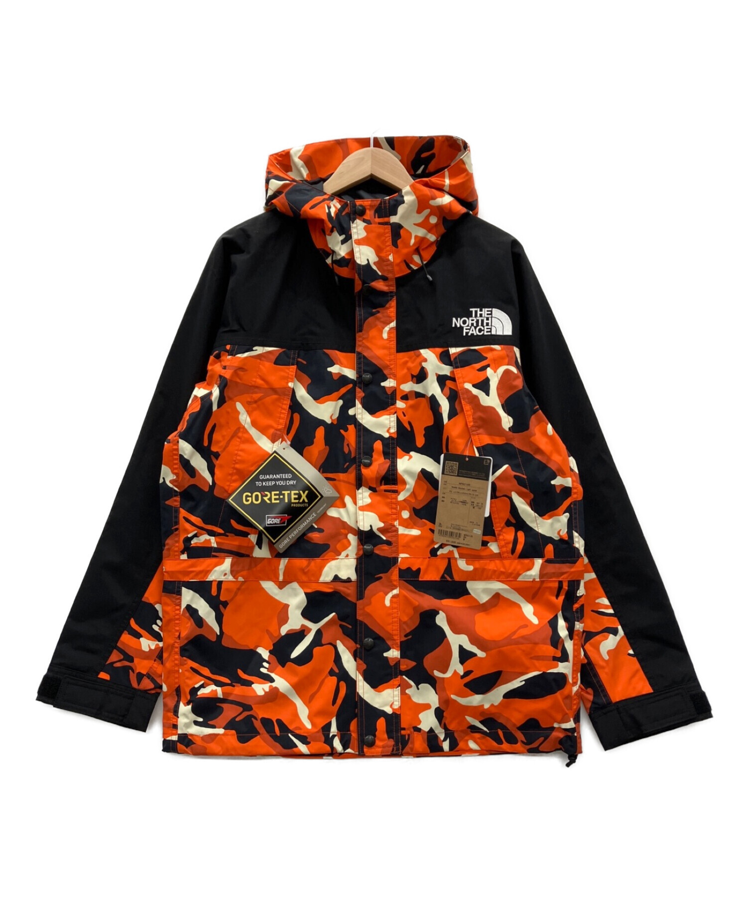 THE NORTH FACE (ザ ノース フェイス) ノベルティマウンテンライトジャケット レッドオレンジエクスプローラーカモ サイズ:M