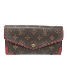 LOUIS VUITTON（ルイ ヴィトン）の古着「長財布 ポルトフォイユ サラ レティーロ  モノグラム」｜レッド×ブラウン