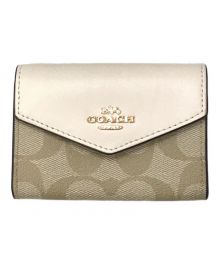 COACH（コーチ）の古着「シグネチャー フラグメントケース」