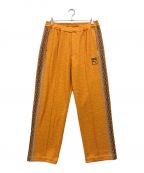 PUMA×SASQUATCHfabrix.プーマ×サスクワッチファブリックス）の古着「別注 TRACK PANTS」｜オレンジ