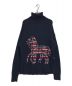 COACH（コーチ）の古着「Horse And Carriage Intarsia Turtleneck」｜ネイビー