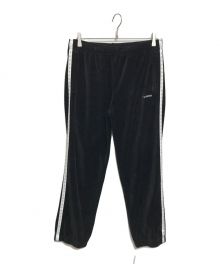 SUPREME（シュプリーム）の古着「Studded Velour Track Pants」｜ブラック