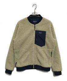 Patagonia（パタゴニア）の古着「Retro-X Bomber Jacket」｜アイボリー×ネイビー