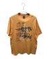 stussy（ステューシー）の古着「プリントTシャツ」｜オレンジ