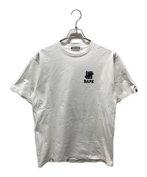 A BATHING APE（アベイシングエイプ）A BATHING APE (アベイシングエイプ) UNDEFEATED (アンディフィーテッド) プリントTシャツ ホワイト サイズ:XLの古着・服飾アイテム