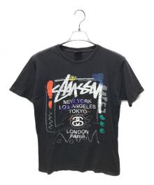 stussy（ステューシー）の古着「ワールドツアーペイントTシャツ」｜ブラック