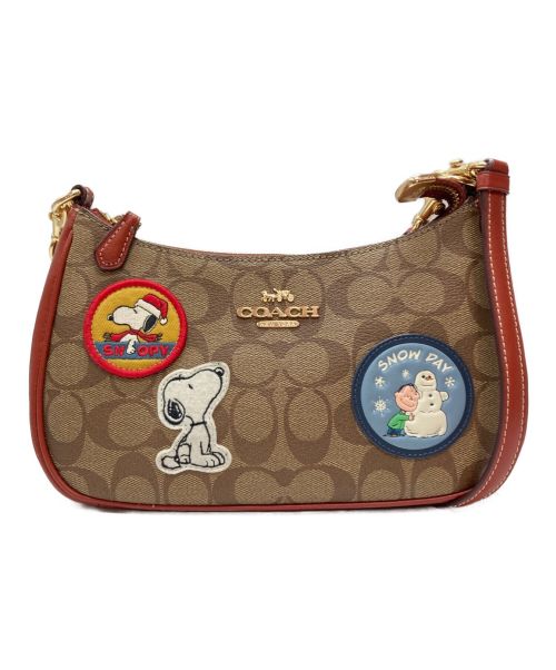 COACH（コーチ）COACH (コーチ) PEANUTS (ピーナッツ) テリ ショルダー バッグ・シグネチャー キャンバス・パッチ ブラウンの古着・服飾アイテム