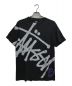 stussy（ステューシー）の古着「プリントTシャツ」｜ブラック