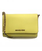 MICHAEL KORSマイケルコース）の古着「Jet Set Travel MediumCrossbody Bag」｜イエロー