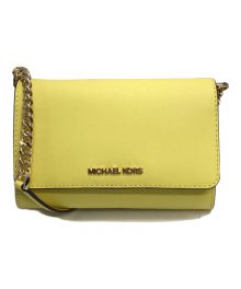 MICHAEL KORS（マイケルコース）の古着「Jet Set Travel MediumCrossbody Bag」｜イエロー