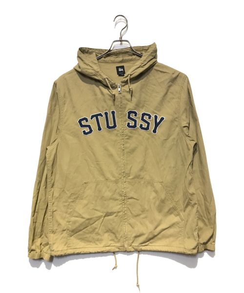 stussy（ステューシー）stussy (ステューシー) アーチロゴ フーデッドジャケット ベージュ サイズ:XLの古着・服飾アイテム