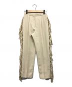 CLANEクラネ）の古着「FRINGE TAPERED PANTS」｜ベージュ