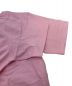 中古・古着 KAWS (カウズ) KAWS：HOLIDAYポケットTシャツ ピンク サイズ:L 未使用品：7000円
