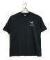 PALACE（パレス）の古着「Palace x Oakley T-Shirt  コラボTシャツ　半袖　S/S  ロゴプリントTシャツ　バックプリントTシャツ」｜ブラック×グレー