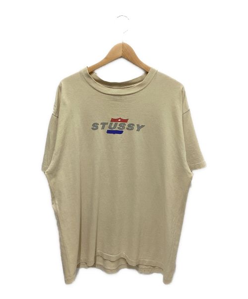 stussy（ステューシー）stussy (ステューシー) プリントTシャツ ベージュ サイズ:X−LARGEの古着・服飾アイテム