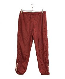 SUPREME（シュプリーム）の古着「warm up pants」｜レッド