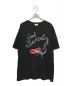 Saint Laurent Paris（サンローランパリ）の古着「スモーキングリッププリントTシャツ」｜ブラック