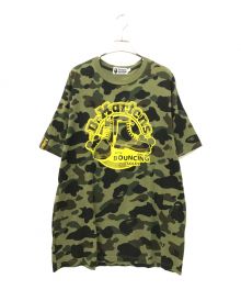 A BATHING APE×Dr.Martens（アベイシングエイプ×ドクターマーチン）の古着「コラボカモ柄プリントTシャツ」｜オリーブ