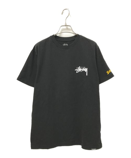 stussy（ステューシー）stussy (ステューシー) Schott (ショット) プリントTシャツ ブラック サイズ:Mの古着・服飾アイテム