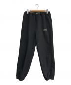 COOTIE PRODUCTIONSクーティープロダクツ）の古着「Polyester Twill Track Pants　CTE-22S117」｜ブラック