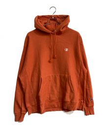 Champion（チャンピオン）の古着「リバースウィーブパーカー」｜オレンジ