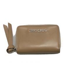 JIMMY CHOO（ジミーチュウ）の古着「ラウンドジップコインケース」｜ベージュ